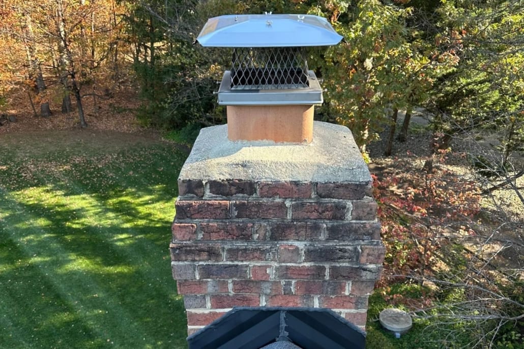 Completed_Chimney_Repair__Flue_Cap_Installation_Great_Falls_VA_-_Sixpenny_Chimney_Sweeps After Chimney Flue Cap installation and Mortar Chimney Crown Repair in Great Falls, VA home