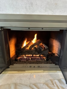 Gas Log Installation in Montclair VA by Sixpenny Chimney Sweeps Gas log installation with realistic vented gas logs in Montclair VA fireplace