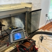 Level 2 Chimney Inspection Montclair VA 22025 Level 2 chimney inspection using a chimney camera system inside a residential fireplace in Montclair, VA.